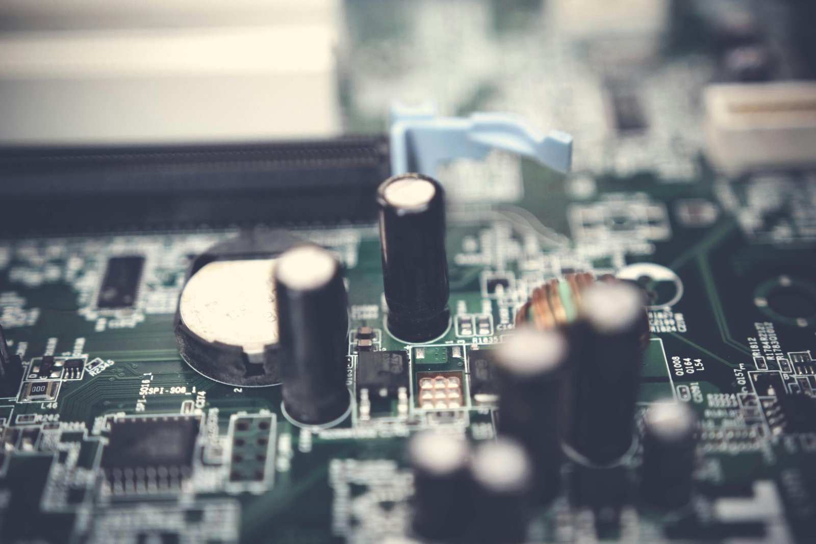 Detailed view of electronic components on a circuit board showcasing various parts.